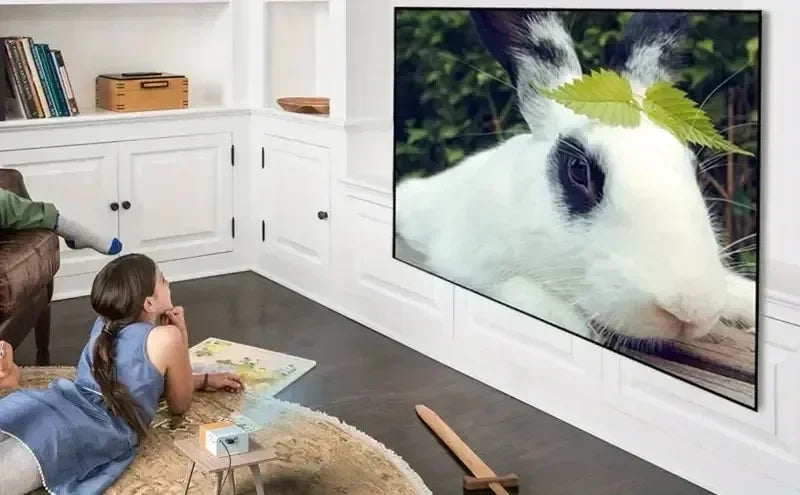 Mini projecteur '' LE TOP DU RENDU VISUEL '', prise et télécommande en charge pour smartphones USB